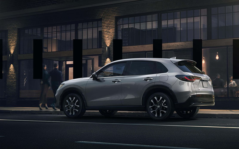 2026 Honda HR-V IMG3 Grey 2026 Honda HR-V driving down the road