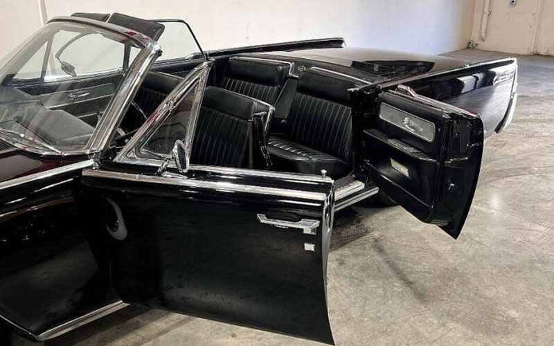 Black 1961 Lincoln Continental doors.
