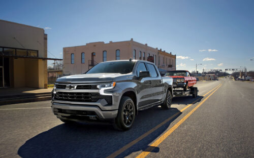 Chevrolet Silverado towing a car
