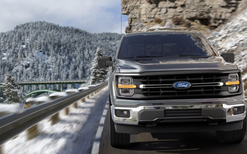 A 2025 Ford F-150 on a mountain highway