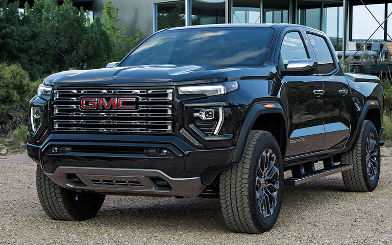 2026 GMC Canyon Hero 2026 GMC Canyon parked outside a building