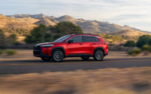 2026 Red Toyota Corolla Cross Driving