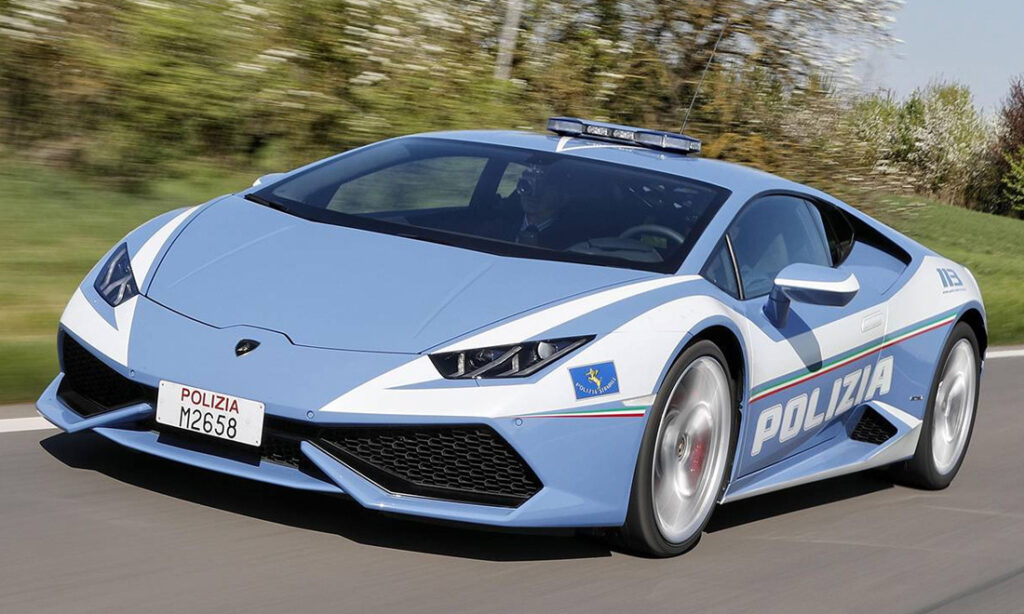 A light blue 2024 Lamborghini Gallardo police car in Italy