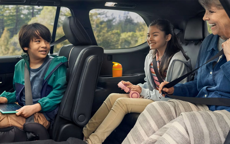 Passengers inside of a 2026 Toyota Grand Highlander