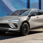 A silver 2026 Buick Envista on a city street