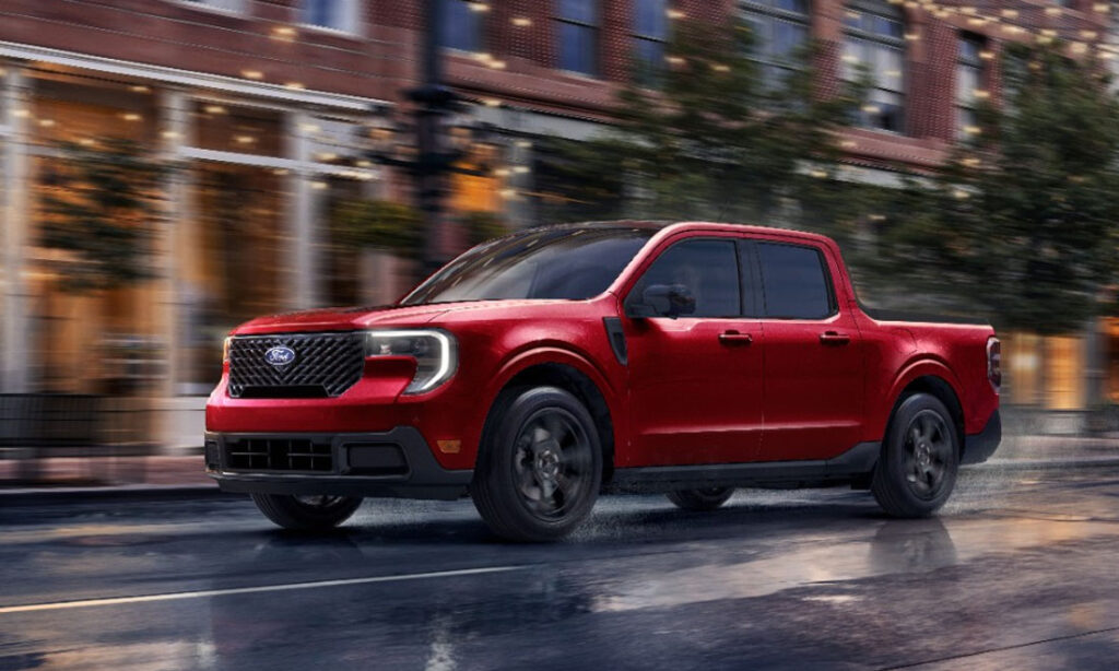 Red 2026 Ford Maverick driving on the road