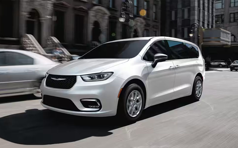 2026 Chrysler Pacifica Driving White 2026 Chrysler Pacifica Driving