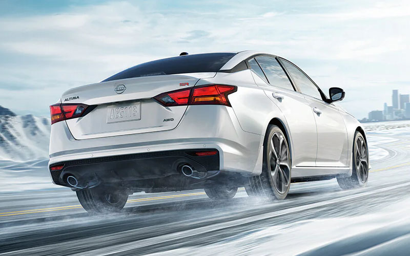 White 2026 Nissan Altima driving