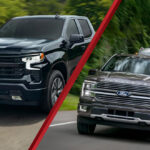2026 Ford F-150 and 2026 Chevrolet Silverado 1500 driving down the road